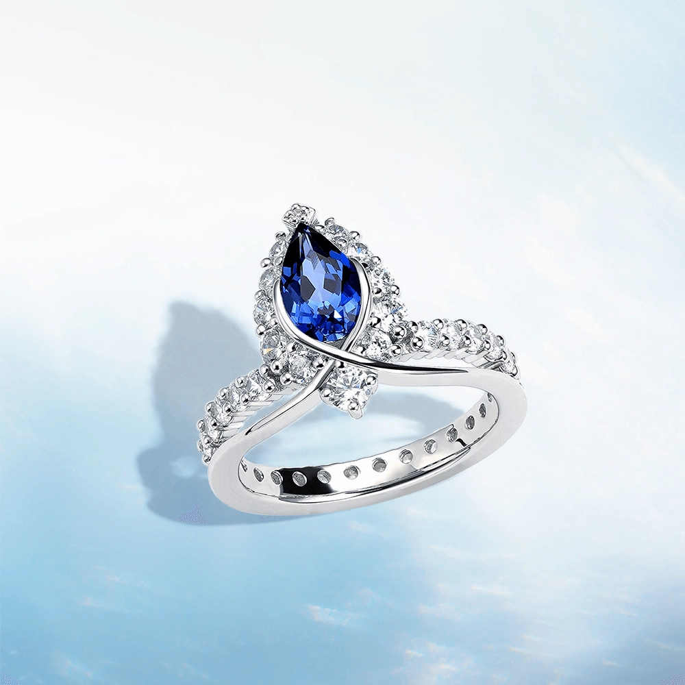 "ENDLESS BLUE" Luxe Crown Pear Shaped Sapphire Ring Artful Detail