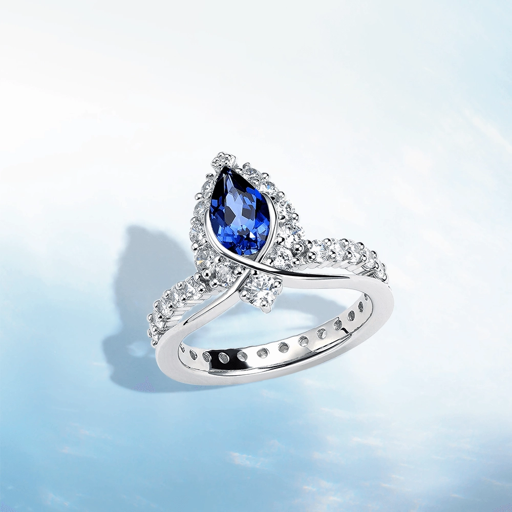 Abstract Design "ENDLESS BLUE" Luxe Crown Pear Shaped Sapphire Ring