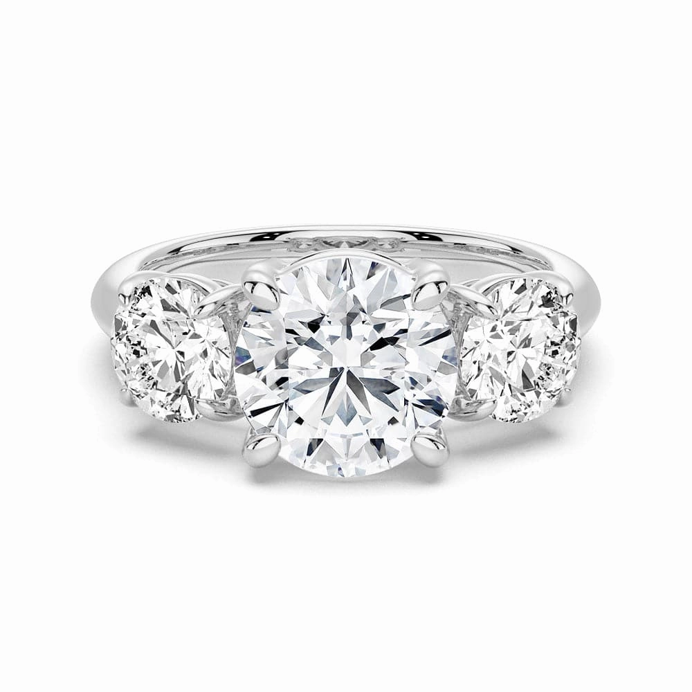 Stylish Expression Round Cut Three Stone Moissanite Engagement Ring