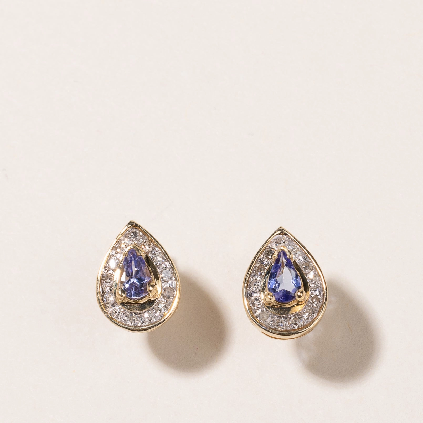 Shining Sparkle 10-14K Yellow Gold Tanzanite and Diamond Earrings | 0.42ctw, 0.21ctw
