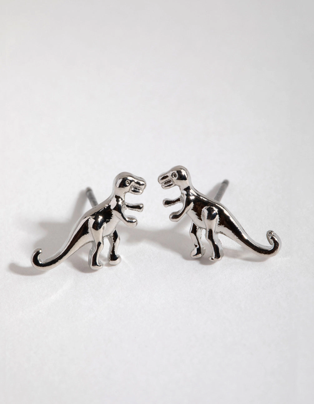 Silver T-Rex Stud Earrings Vibrant Embellishment Glittering Adornment