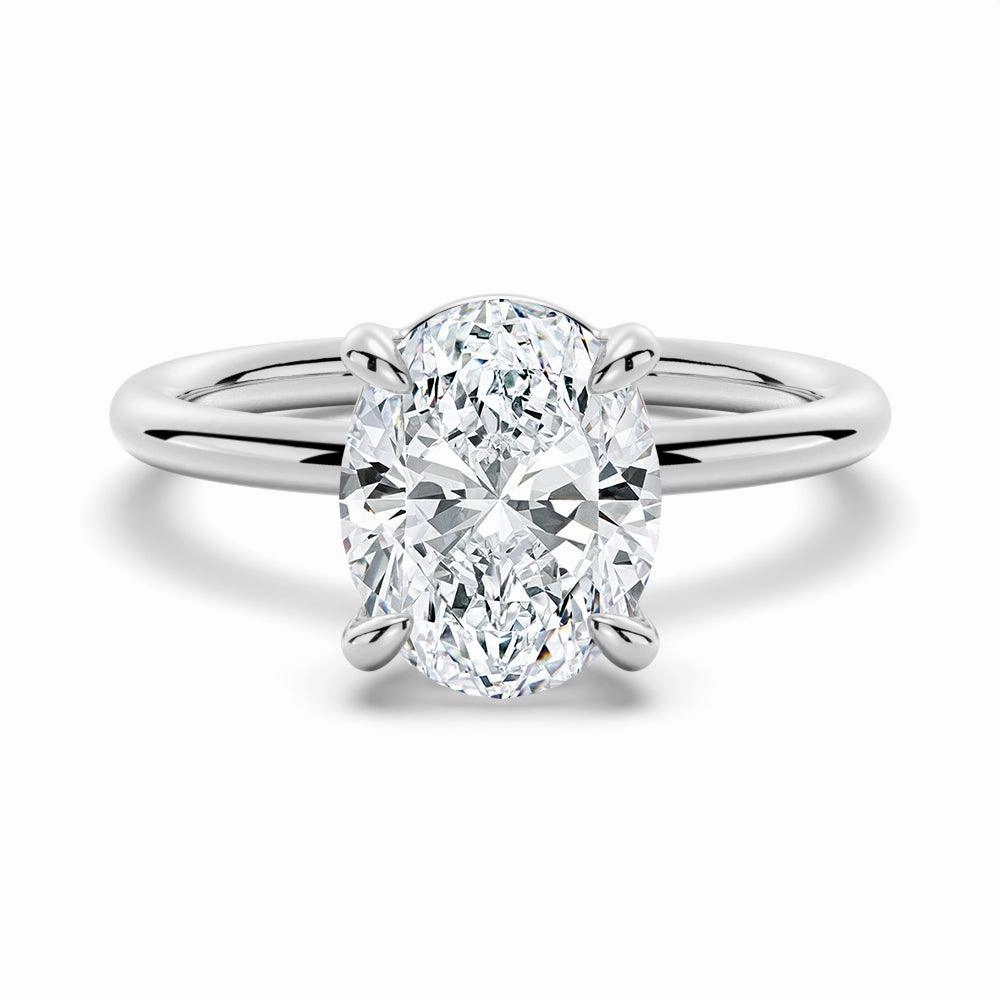 festival look Four Prongs Oval Solitaire Moissanite Engagement Ring