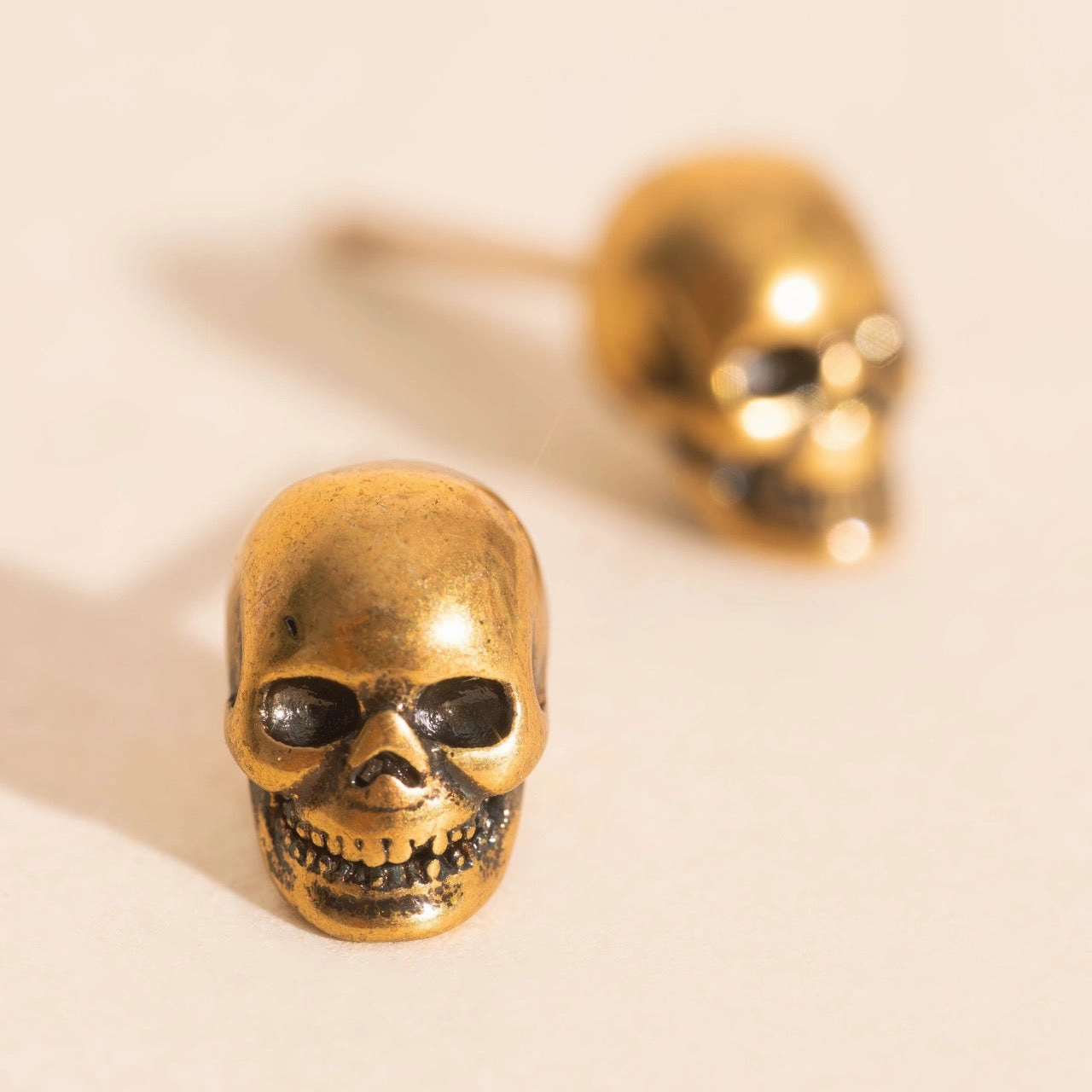 Polished Accent Skull Stud Earrings