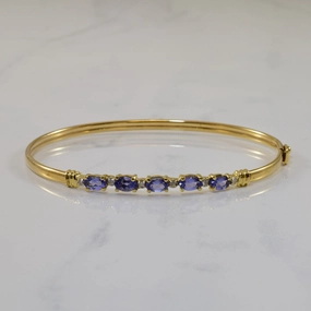 Versatile Touch Chic Glimmer Tanzanite & Diamond Bangle Bracelet | 1.00ctw, 0.03ctw | 7.5" |