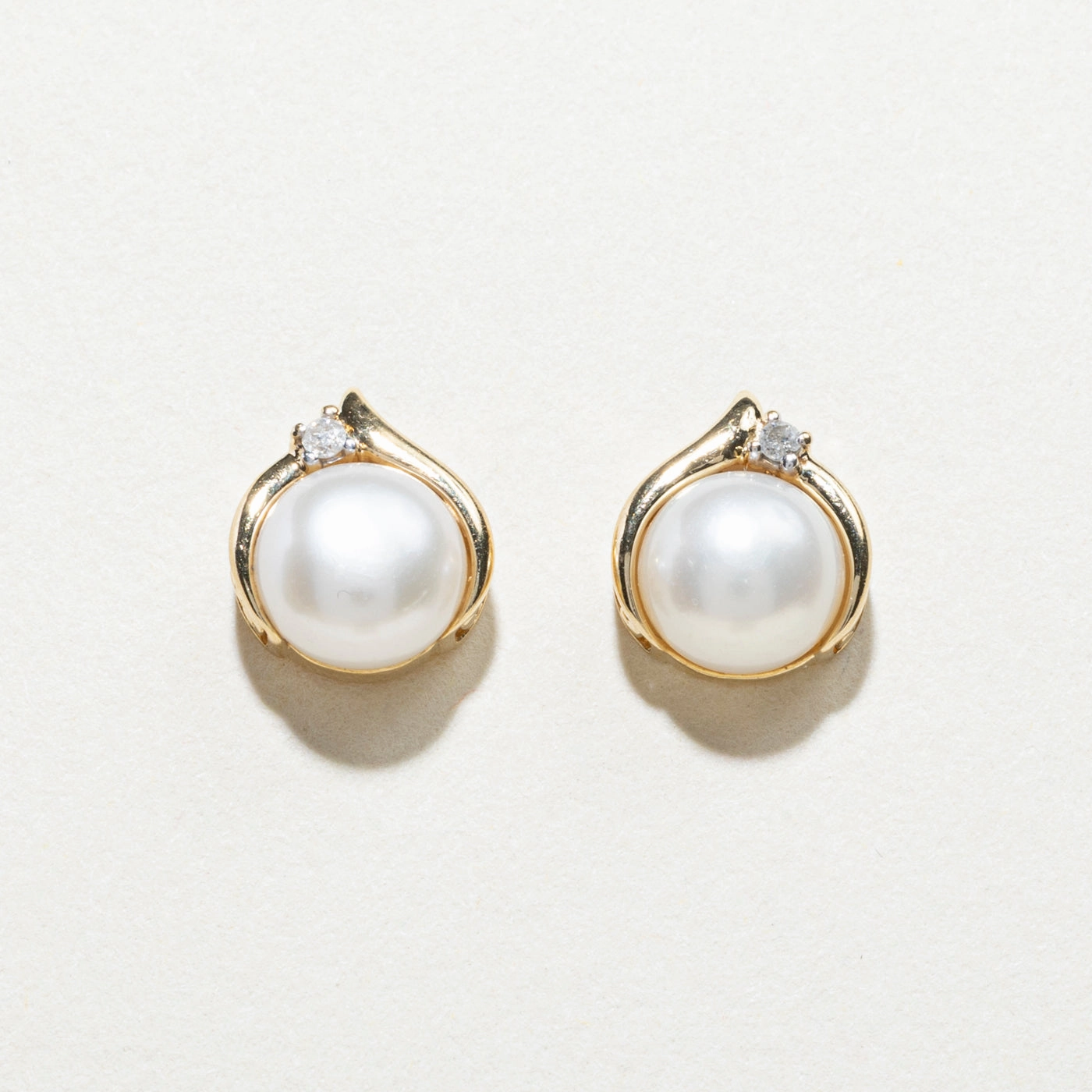 Elegant Appeal Lustrous Highlight Pearl & Diamond Stud Earrings | 0.03ctw