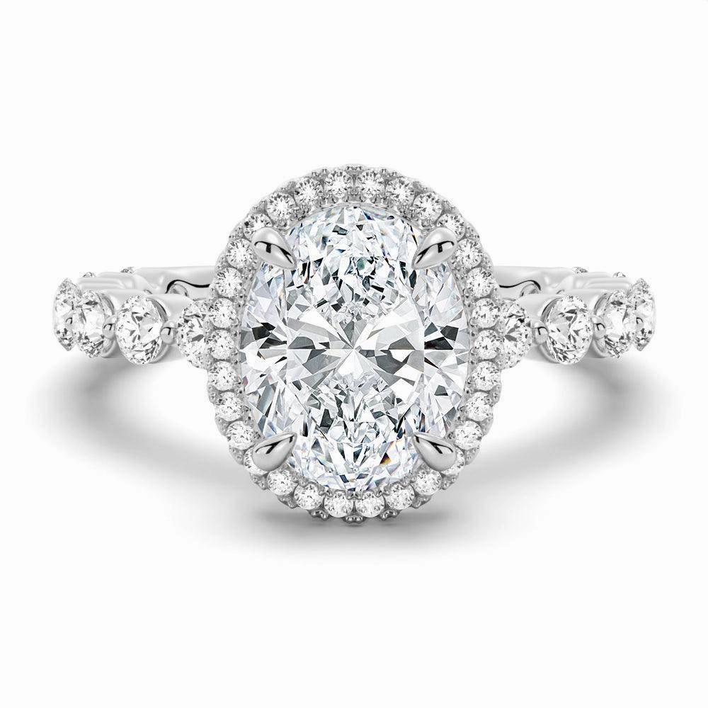 Innovative Style Oval Halo with Pav?? Shared Prong Band Moissanite Engagement Ring