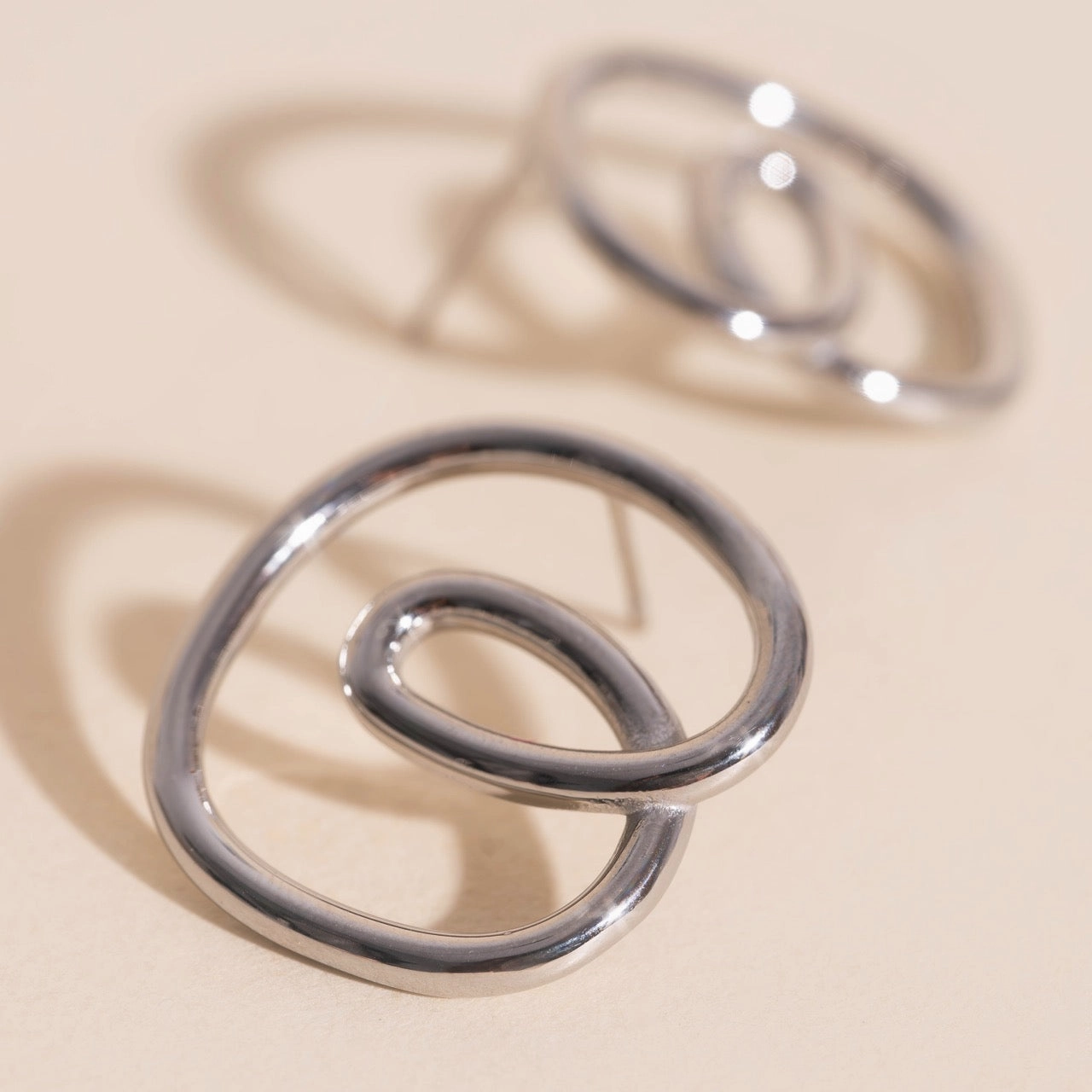 Rip Tide Stud Earrings Radiant Finish Pieces