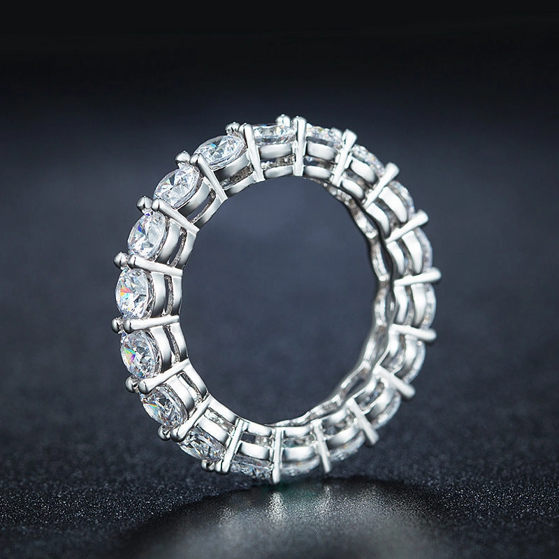 Delicate Object Low Maintenance Rhodium Plated Sterling Silver Ring 4mm CZ Eternity Band Ring in Airline Setting