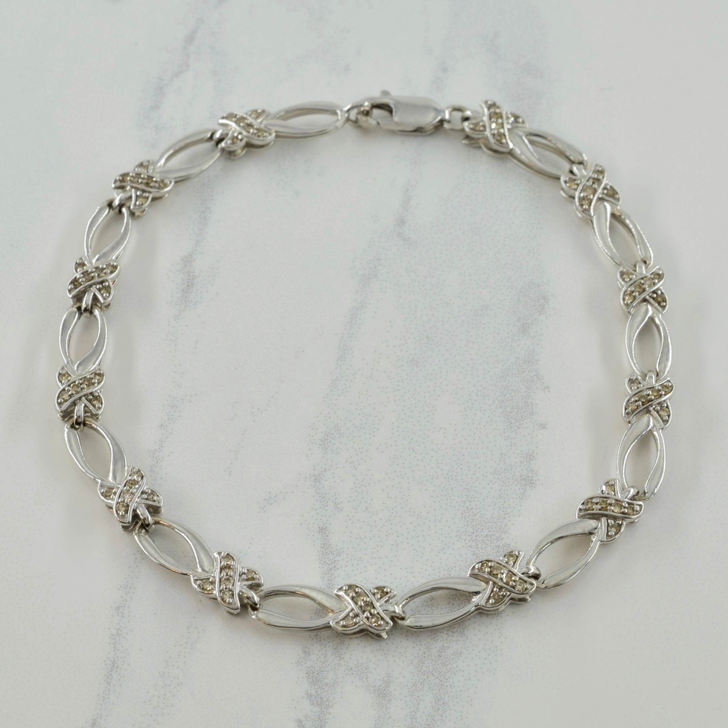 Refined Light Dazzling Accent 'XO' Diamond Bracelet | 0.52ctw | 7.25" |