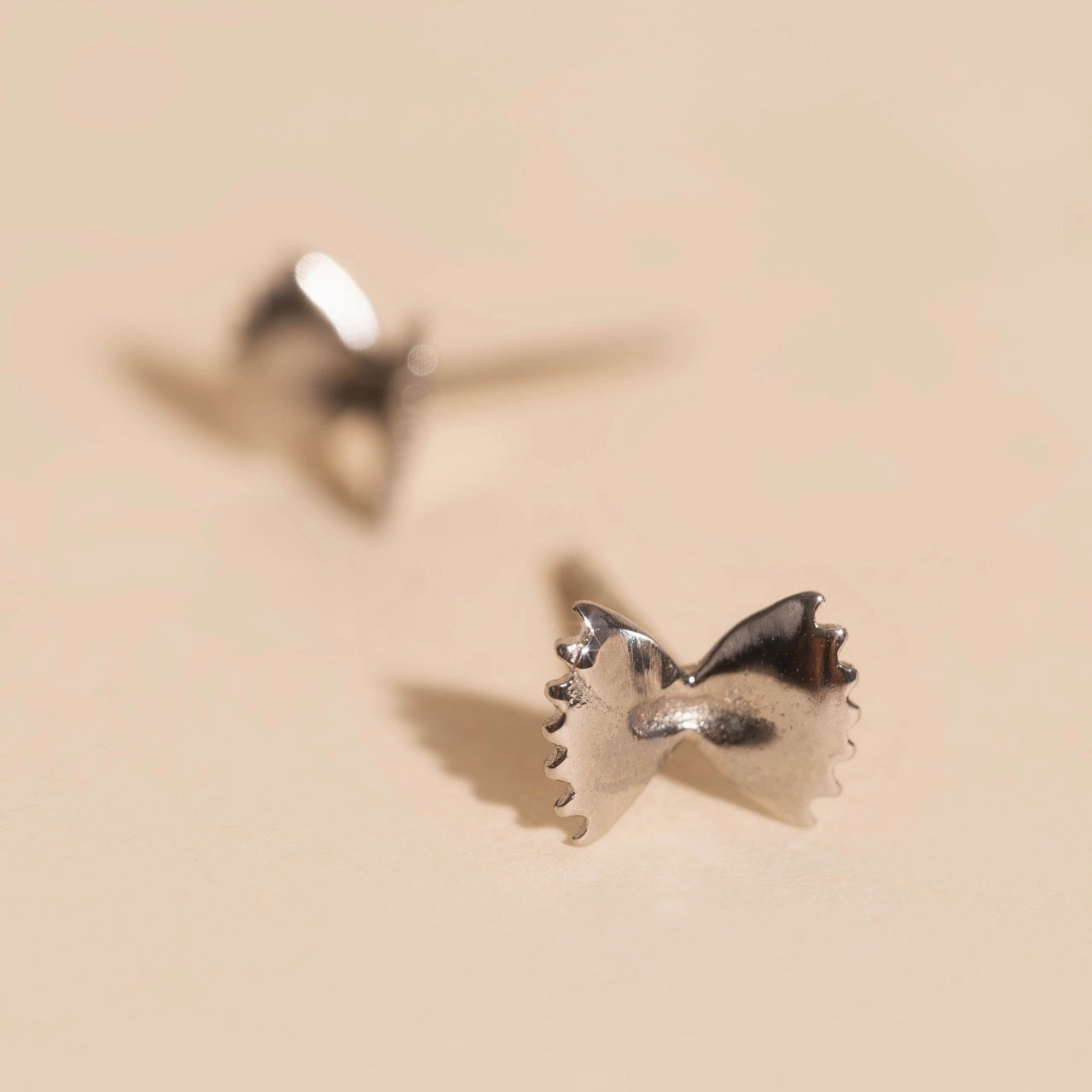 Bowtie Stud Earrings Curved Contour