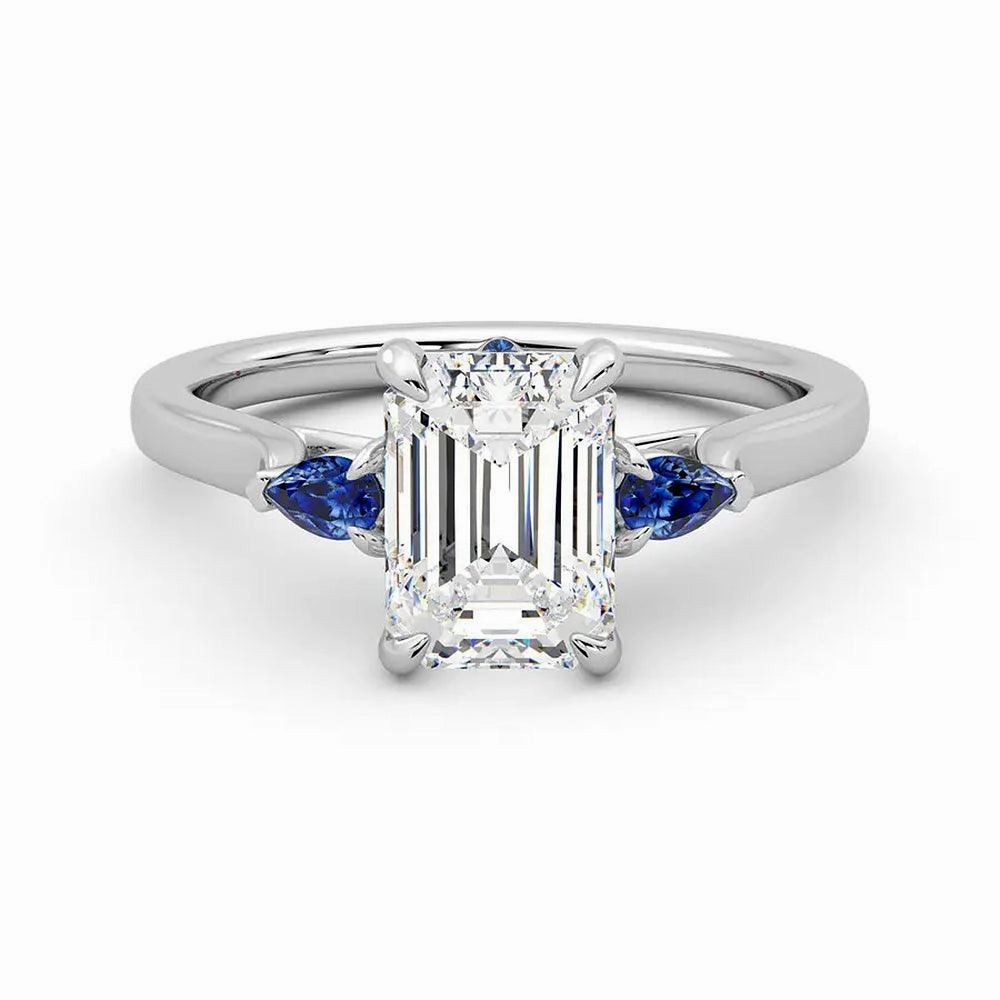 Three Stone Emerald Cut Moissanite Engagement Ring with Hidden Anniversary Stone Accent Unique Emblem