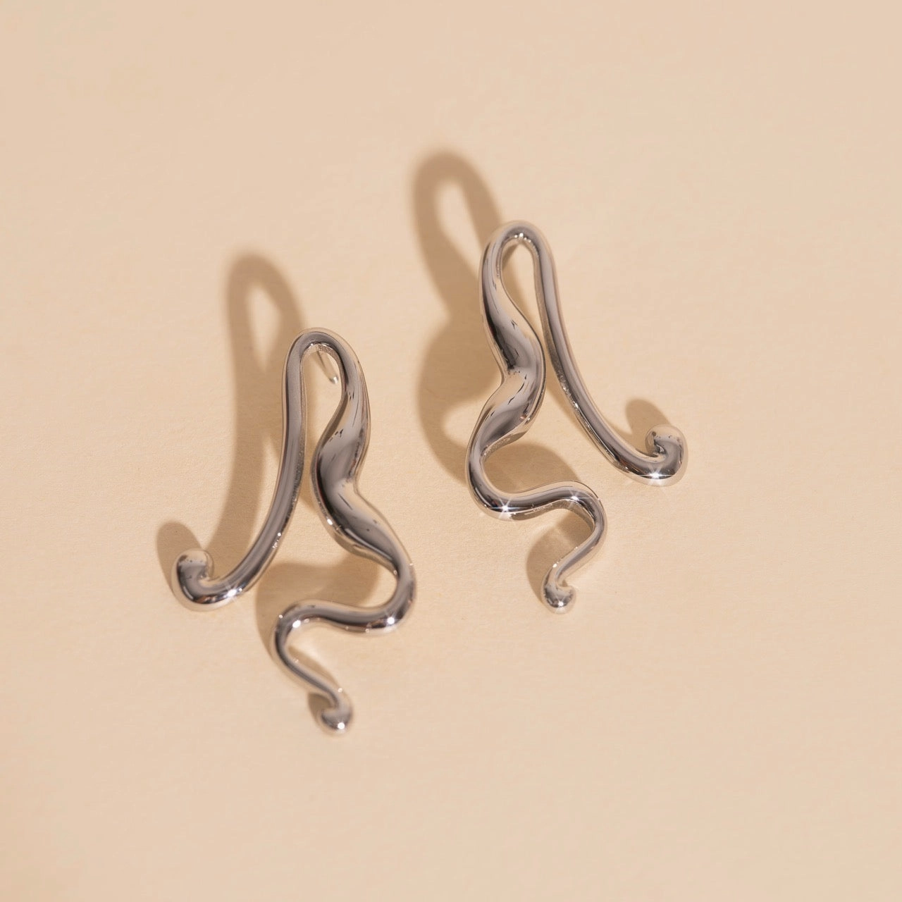 Untied Stud Earrings Charming appeal